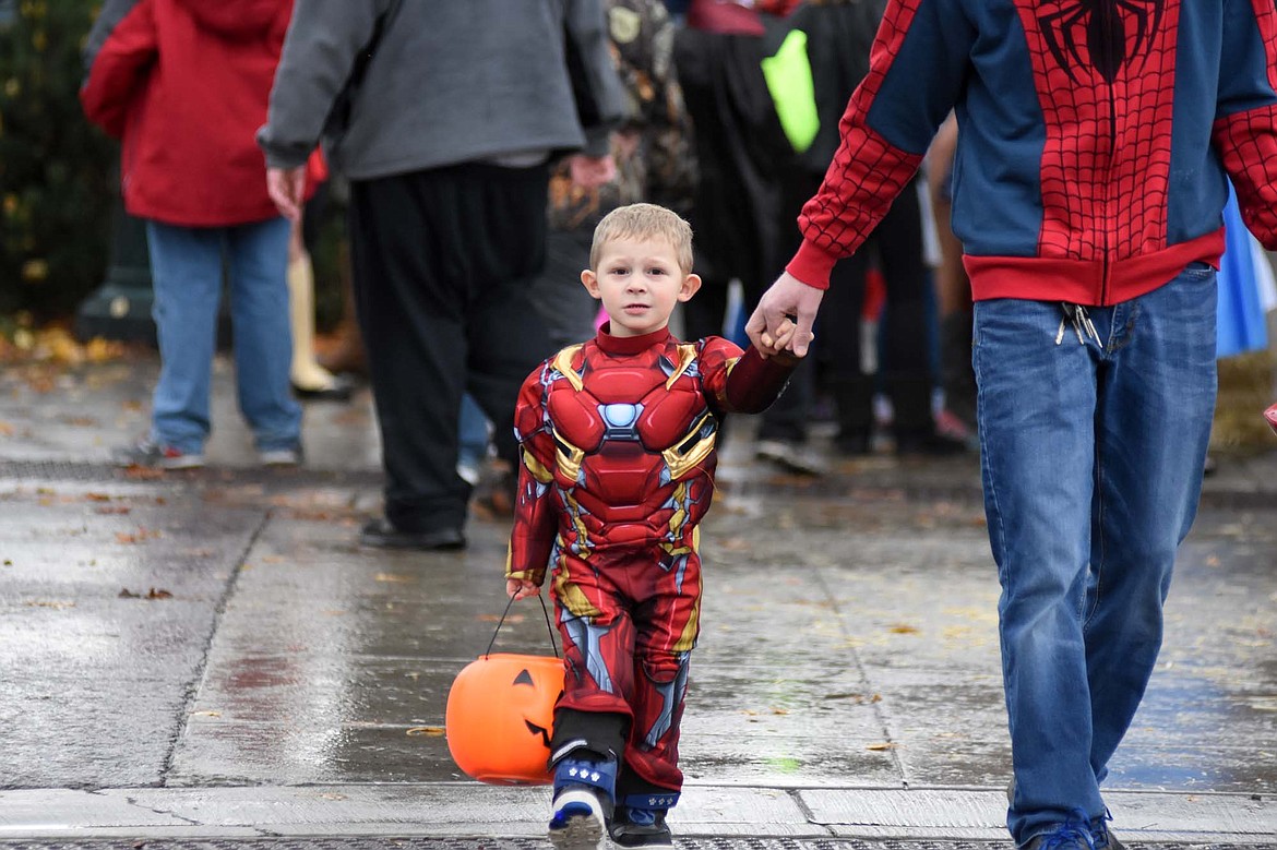 Children in costume filled Central Avenue Monday trick-or-treating at downtown businesses for Halloween.