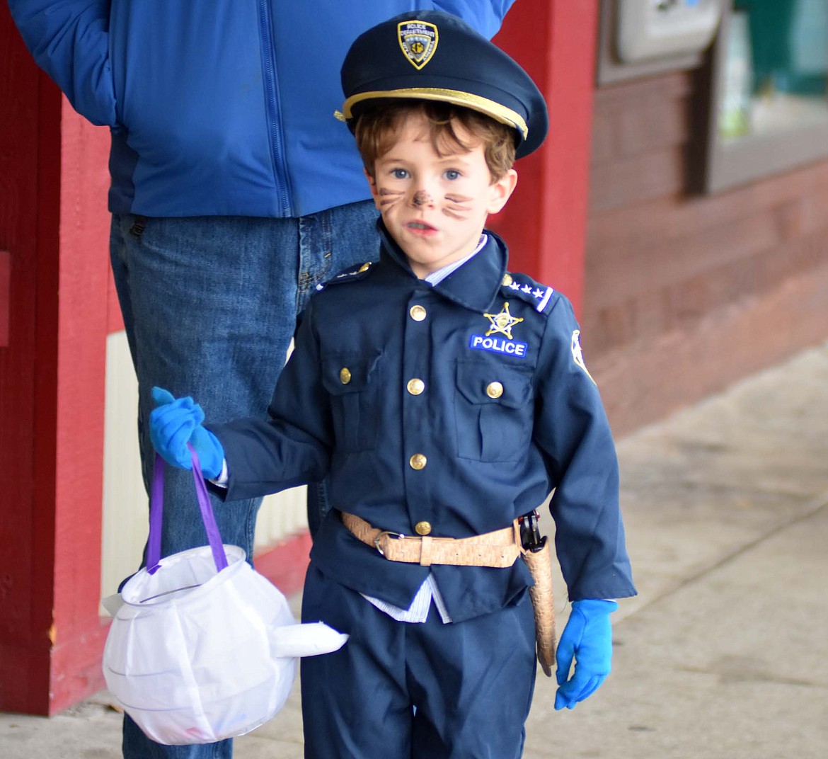 Children in costume filled Central Avenue Monday trick-or-treating at downtown businesses for Halloween.