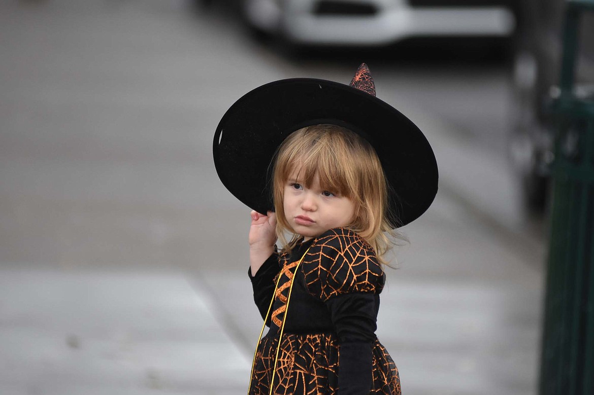 Children in costume filled Central Avenue Monday trick-or-treating at downtown businesses for Halloween.