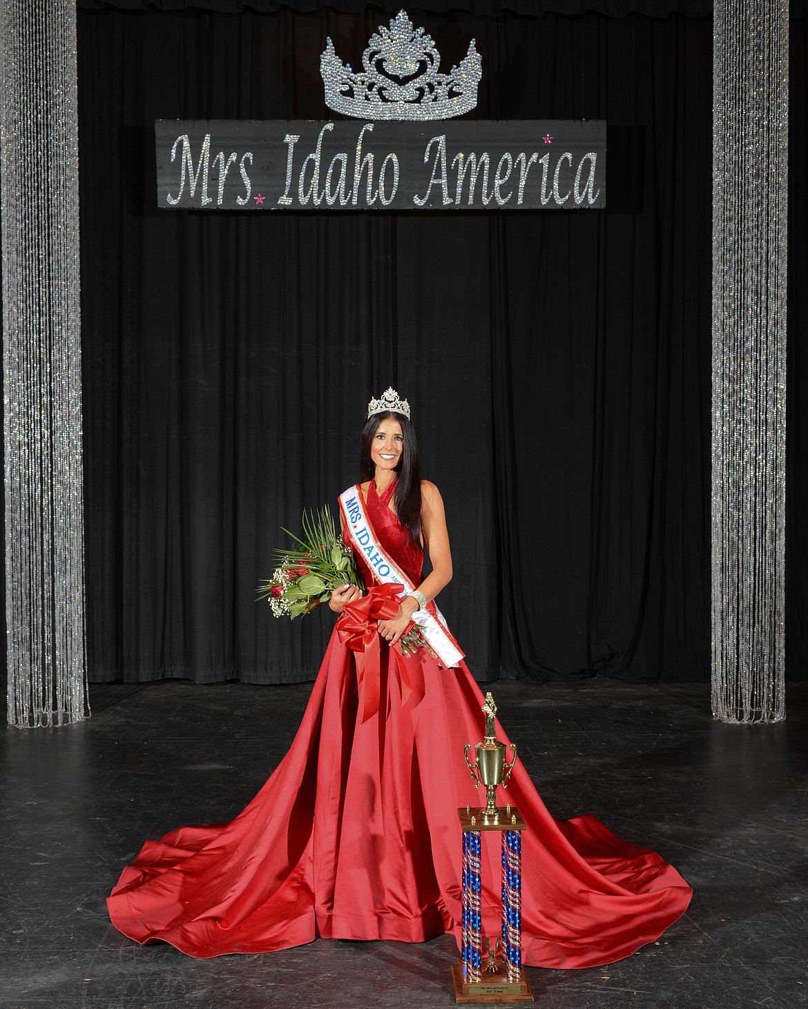 Courtesy photo
Mrs. Kootenai County Michele Sheets, of Athol, won the Mrs. Idaho America crown during the competition in Boise on Saturday. She will represent Idaho at the national event in Vegas in August.