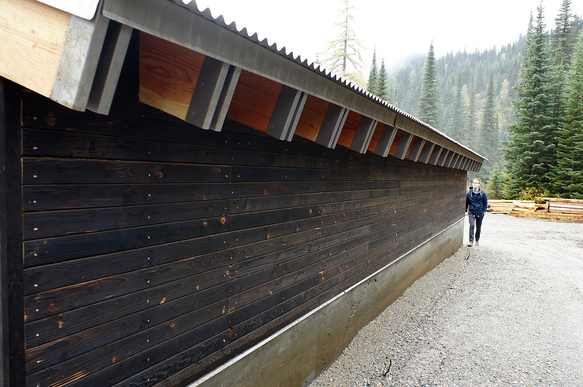 &#151;Photo courtesy of RANDY TEAL
An individual walks along a new warming structure north of Sandpoint in the Moose Creek area.  The structure was designed by University of Idaho College of Art and Architecture students.