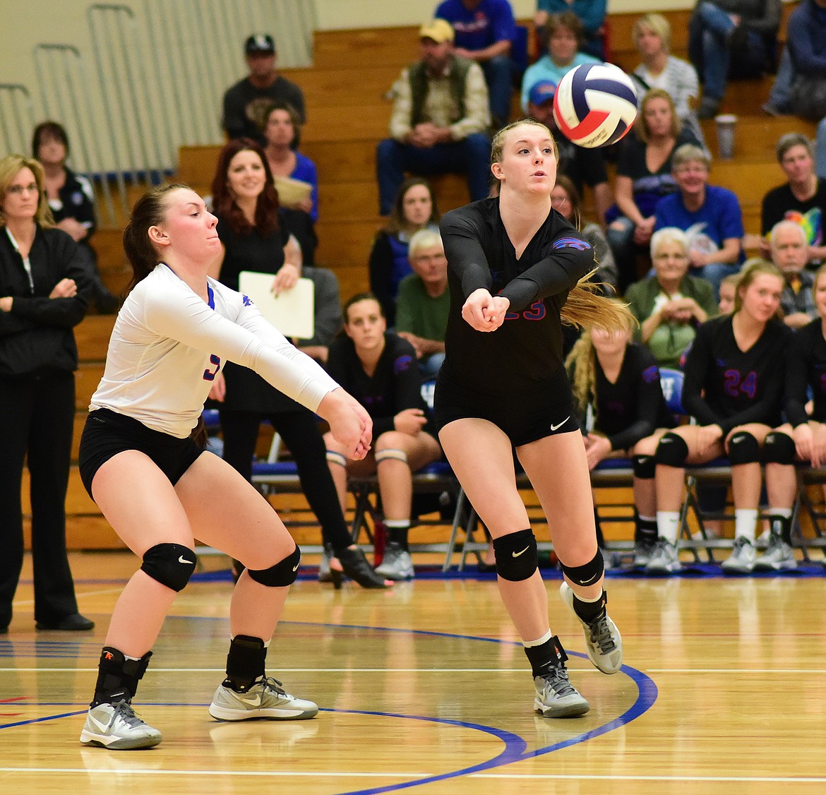 Anna Nicosia, left and Kiara Burlage meet for a dig.