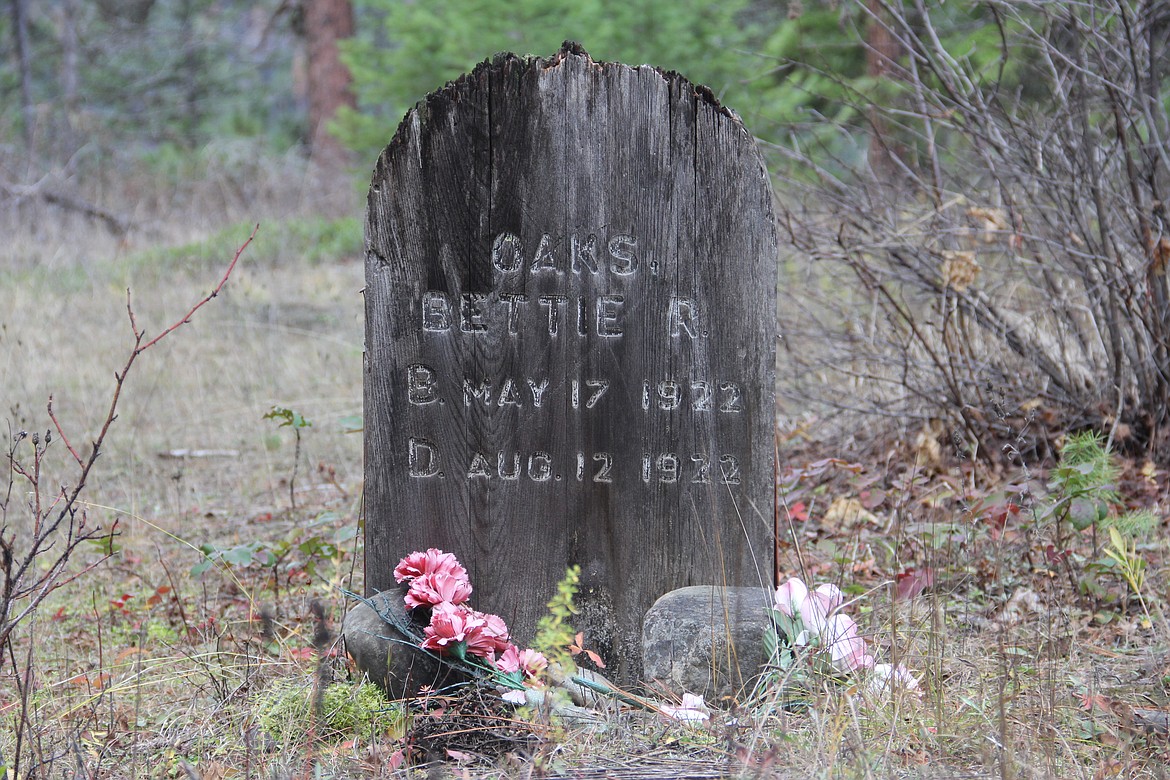 --Photo by DAC COLLINS
The Boulder Creek cemetery has an interesting history of its own. Years back, a local high school teacher by the name of Bob Fitch removed the original wooden grave markers and donated them to the Boundary County Historical Society. Then, with the help of his students, Fitch made replicas of the grave markers and installed them in place of the orginals.