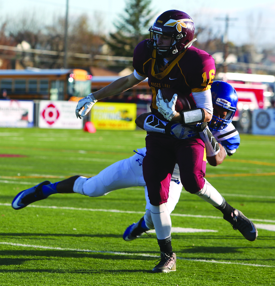 Connor Vanderweyst/Columbia Basin Herald
Moses Lake wide receiver Cameron Duke tries to shed a Bothell tackler.