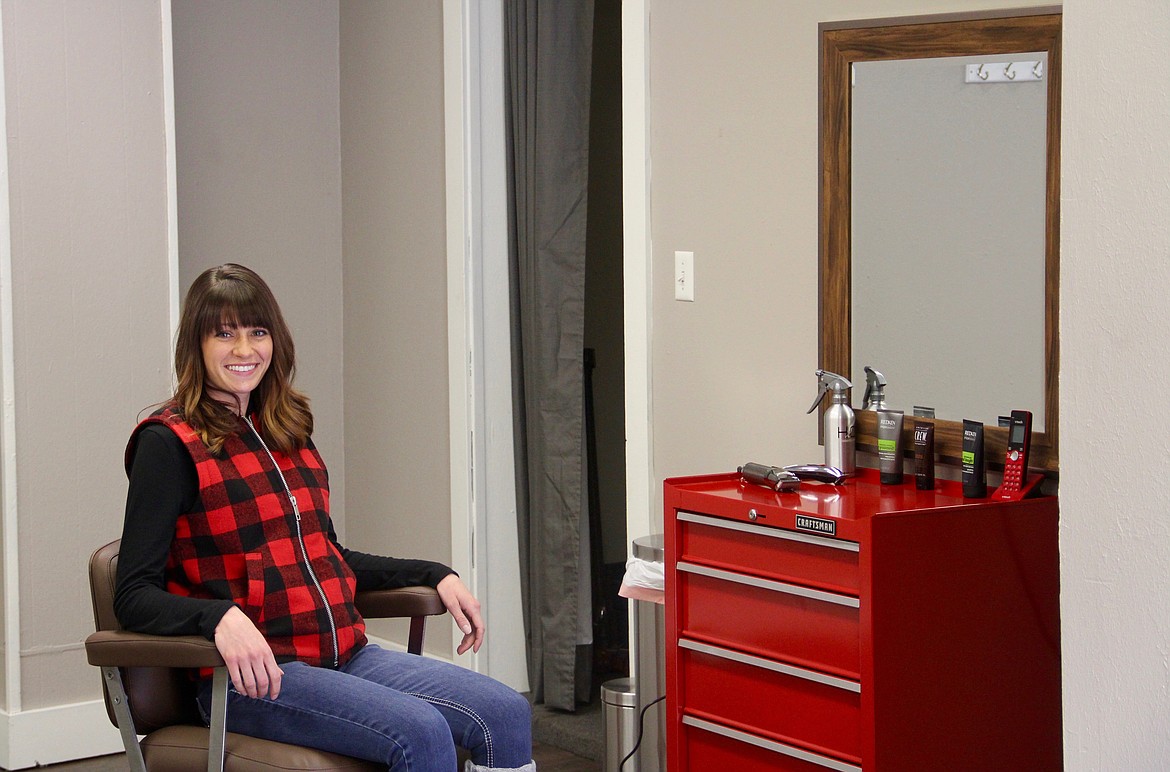 &shy;&#151;Photo by DAC COLLINS
Owner Lindsay Oxford takes a seat at her station inside Lou&#146;s men&#146;s haircutting shop. The shop, which is located downton on Kootenai Street, is currently open for business five days a week.