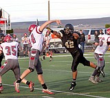 Jenks, defense, lead Royal football to rugged win