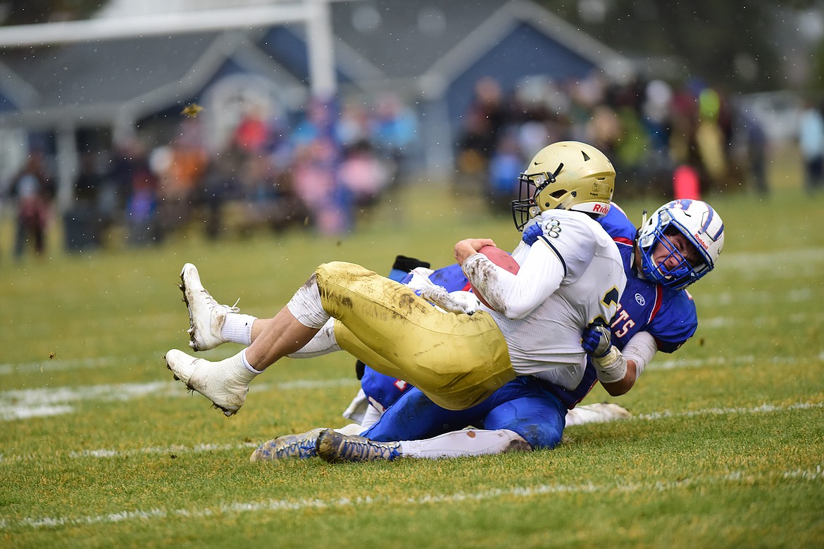 Trevor Hoerner hauls down Dillon&#146;s Troy Anderson.