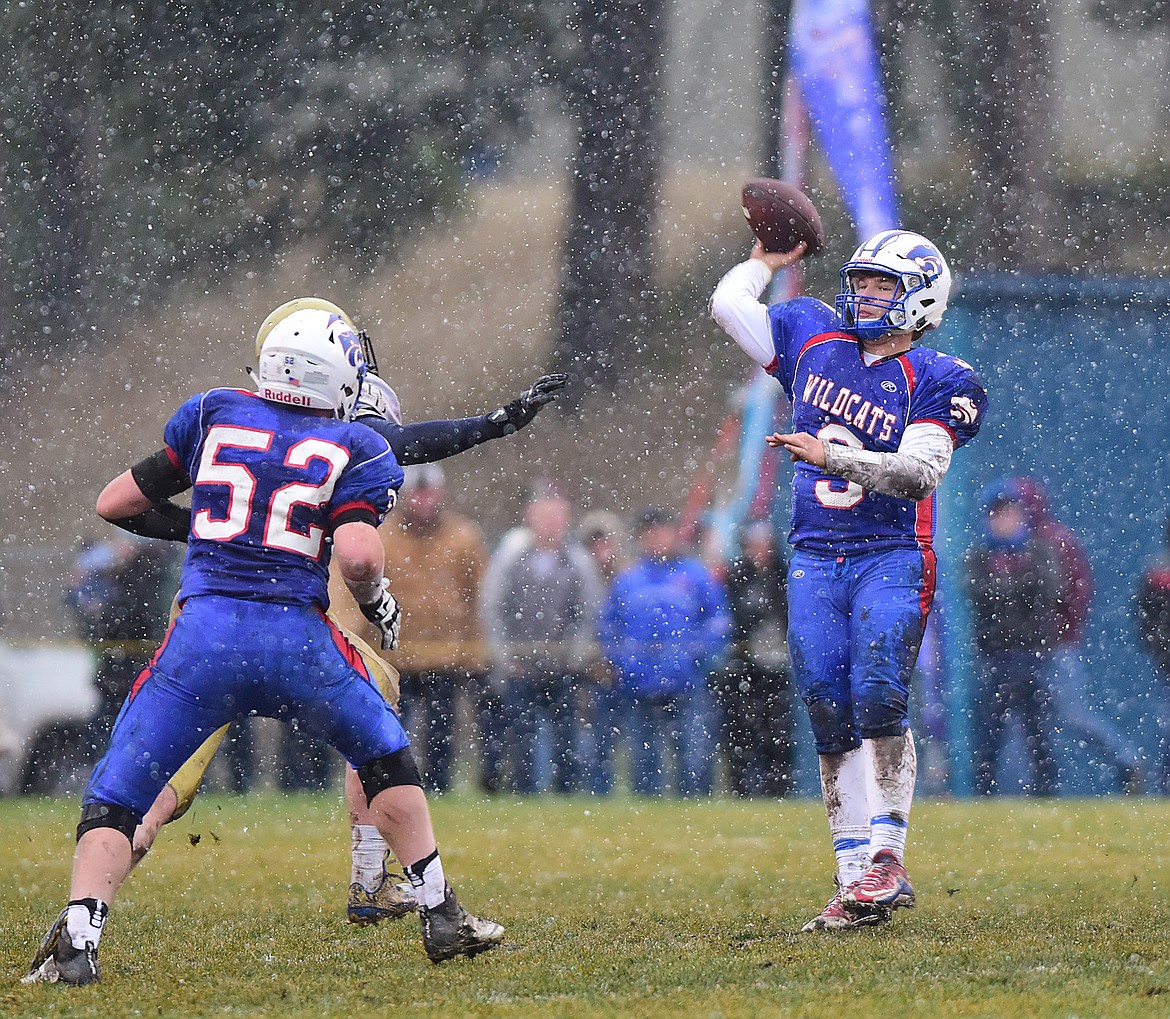 As the snow gets heavier, Bridwell throws a pass.