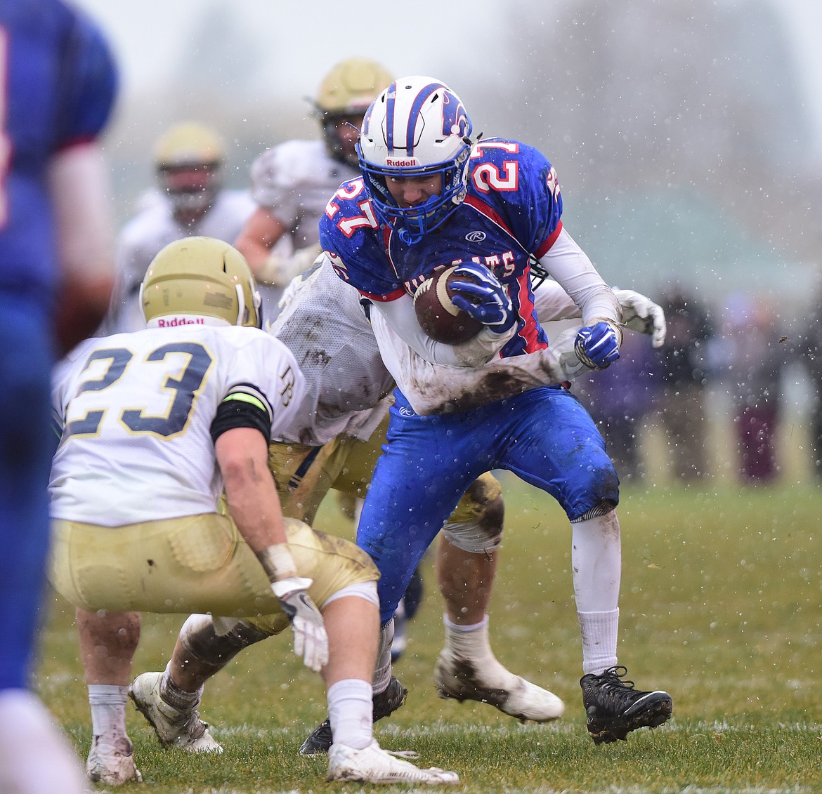 Trey Gates looks to break a tackle.