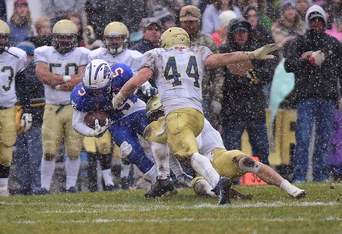 Wyatt Green fights for extra yards.