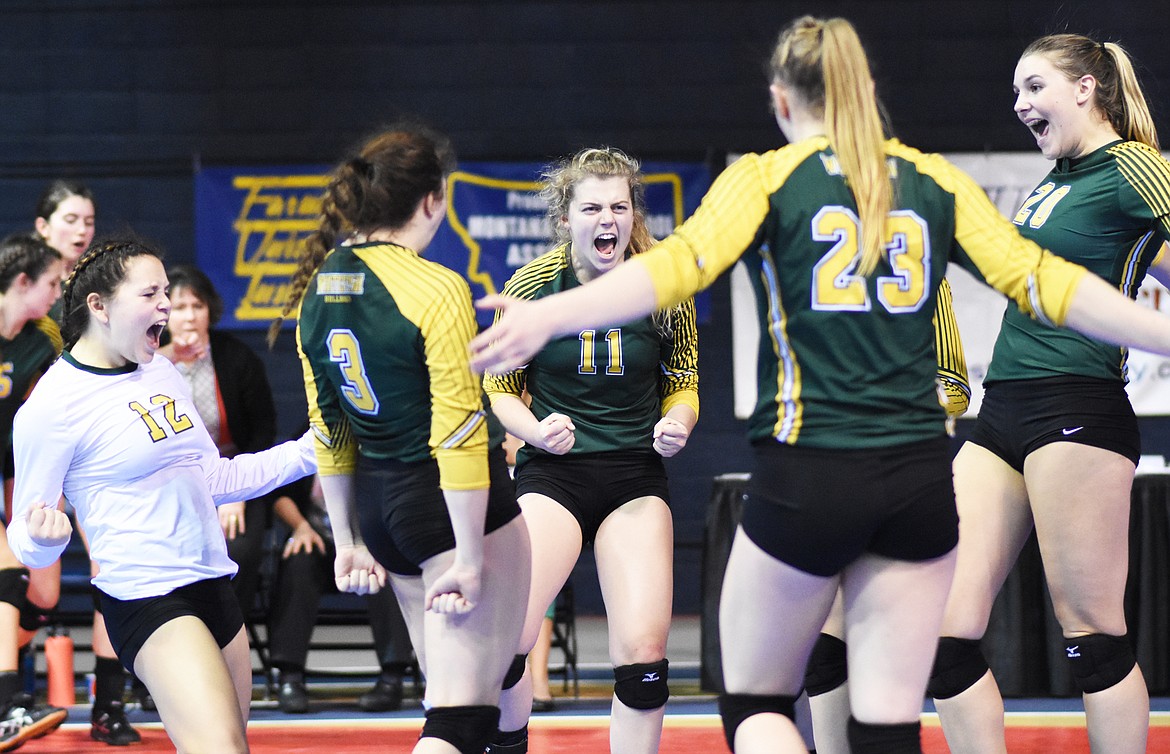 Daniel McKay photos / Whitefish Pilot
The Lady Bulldogs celebrate during a match against Billings Central in the Class A state volleyball tournament in Bozeman.