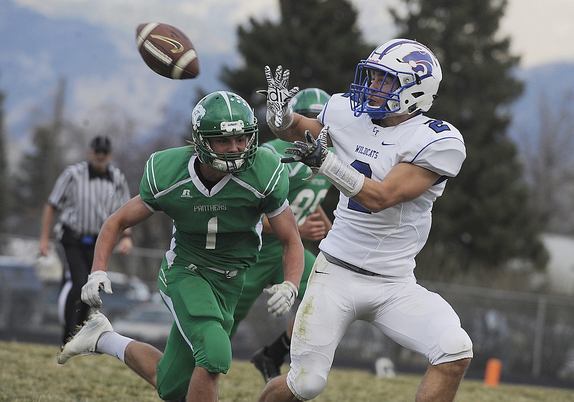 Braxton Reiten makes a catch as teh Belgrade defense chases him.