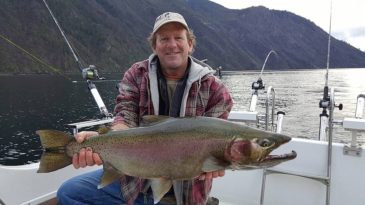 &#151;Courtesy photo
Chris Bier hooked first place in the early going in the Lake Pend Oreille Idaho Club's annual fall derby. The rainbow trout weighed 18.22 pounds and measured 34.5 inches.