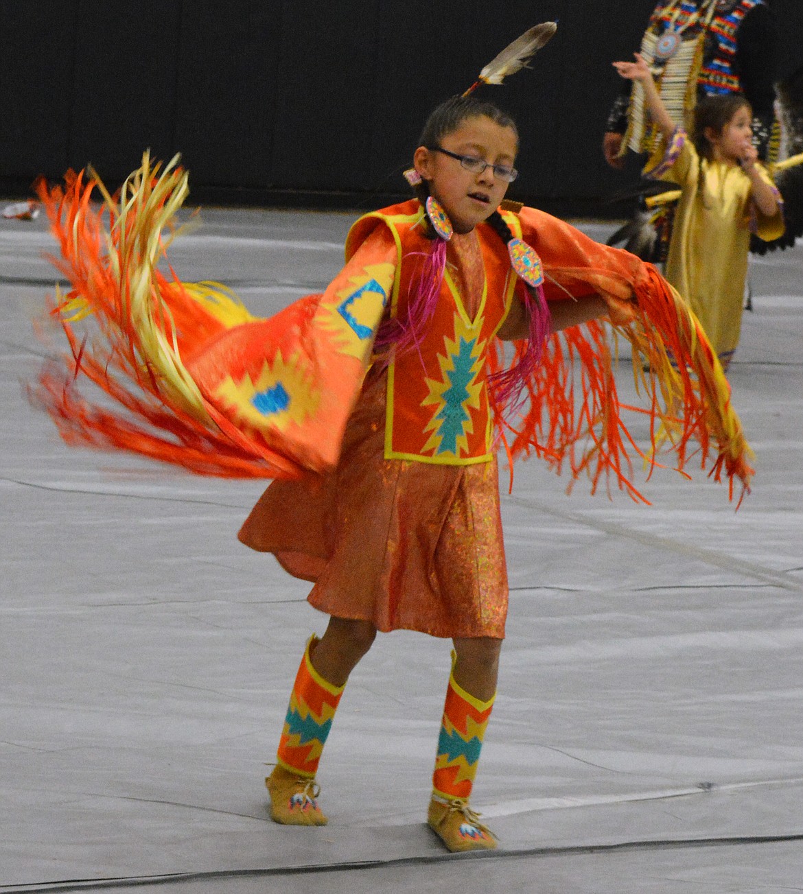 A YOUNG dancer participates in the Head Start Powwow Friday at Ronan High School.