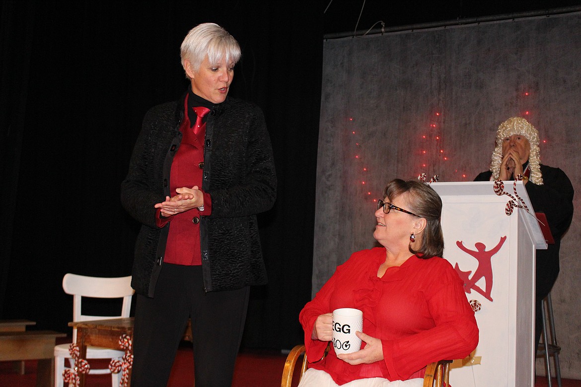 Cheryl Schweizer/Columbia Basin Herald
The Prosecuting Attorney (Charlene Brush, left) questions Mrs. Eggnog (Randy Brown Martin) in the Masquers production of &#145;Jingle Bells Jury,&#146; opening this weekend.