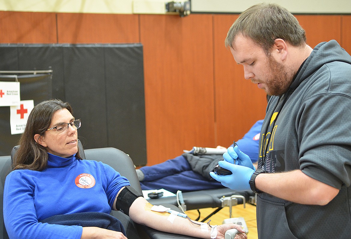 Katy Jensen donates blood at the Whitefish Community Blood Drive at The Wave on Nov. 17.