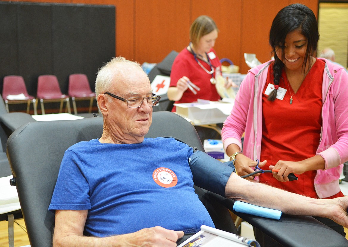 Ed Hannigan donates blood at the Whitefish Community Blood Drive at The Wave on Nov. 17.