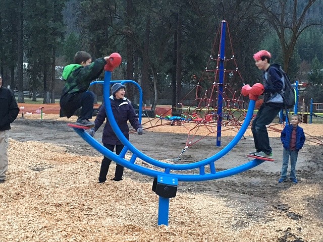 Kids of all ages were the first to play on the new equipment recently installed at the Eva Horning Park in Superior on Nov. 17. (Photo courtesy of Mary Jo Berry)