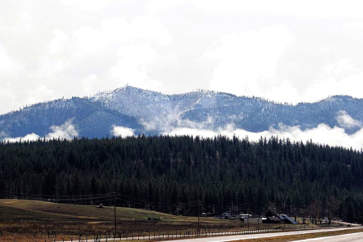 Snow is starting to dust the mountains in Mineral County. With snow and rain forecast over the Thanksgiving holiday as 48.7 million travelers hit the road and sky&#146;s in the U.S. (Photo by Kathleen Woodford/Mineral Independent).