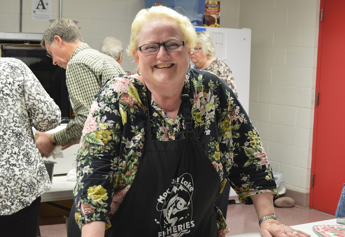 Luann Mohn calls herself the &quot;tactical commander&quot; of the monthly community dinner in Hungry Horse (Anna Arvidson photo).