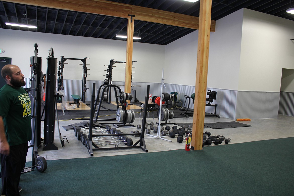 St. Regis athletic director, Jesse Allan stands in the school&#146;s new weight room which is open to the public. (Kathleen Woodford/Mineral Independent)