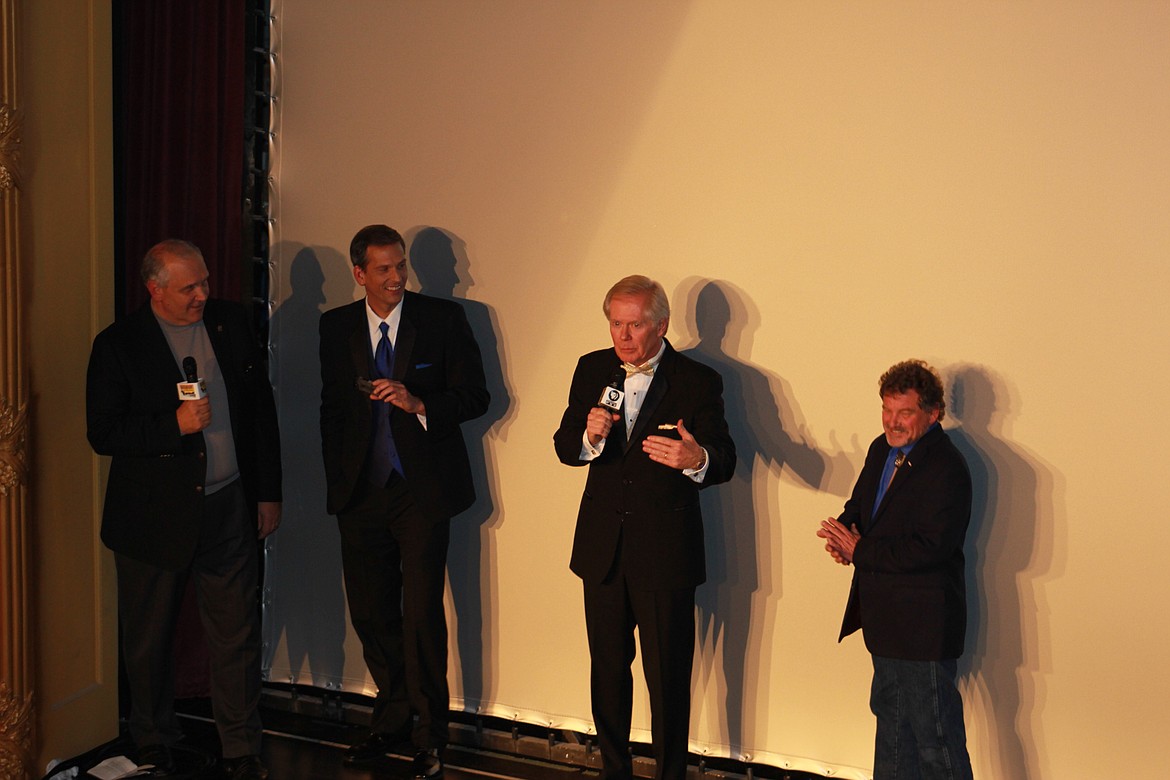 &#147;Backroads of Montana&#148; producers, Ray Ekness (left), John Twiggs, William Marcus, and Gus Chambers, speak to an audience at the Rialto Theatre on Nov. 17 in Deer Lodge. (Photo by Kathleen Woodford/Mineral Independent)