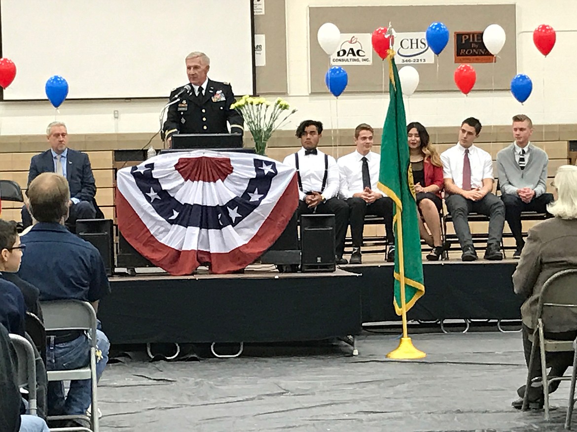 Ted Escobar/The Sun Tribune - Col Gary R. Stephens, US Army retired, addresses the Royal High School student assembly at the Veterans Day Celebration.