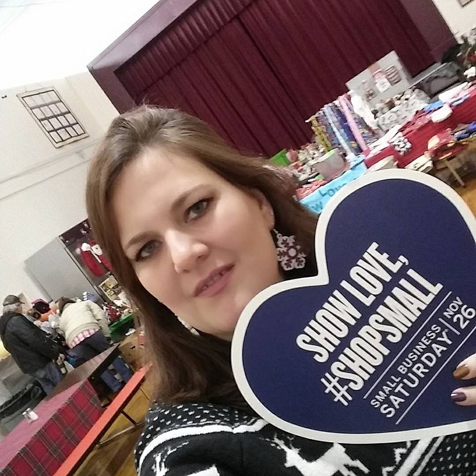 Local small business owner, Zelma Kromrey shows a heart to promote Small Business Saturday held on Nov. 26 to encourage people to shop local. (Photo by Kathleen Woodford/Mineral Independent)