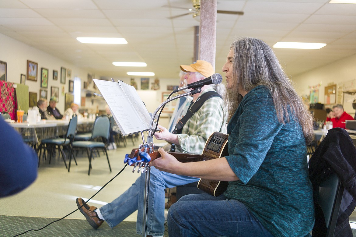 Laura Bell sings &#147;Me and Bobby McGee&#148; while Mark Souhrada plays bass.