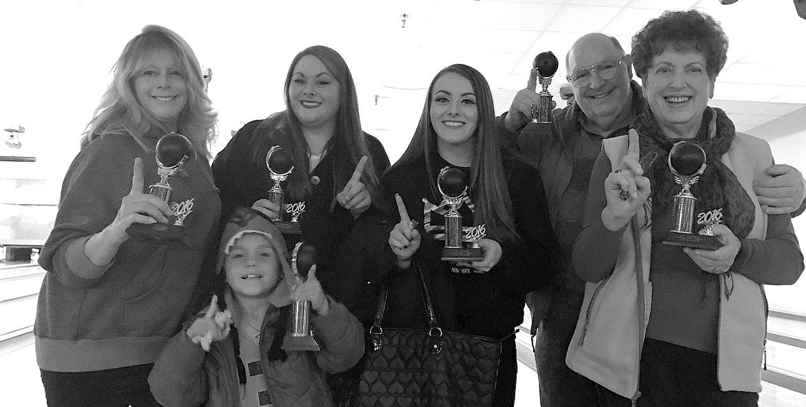 Eric LaFontaine photo 
Event: The annual Columbia Basin Herald Christmas party. Date: Dec. 2. Place: Lake Bowl. Fun bowling and great food. Result: The 2016 CBH bowling champs, determined by the average of two games, left to right, Dana Moreno, Marlea Moreno, Cortney Moreno, Dennis Clay and Garnet Wilson. Down front is five-year-old Angel Ramirez. He was the star of the night. Although he became extremely tired as the evening progressed, he was up and willing to take his turn each time. He picked up a couple of spares and at least one strike, all without help. Garnet and I were about ready to walk out the door, at the end of the evening, when Cortney came running up to us. &#147;We won a trophy,&#148; she said. &#147;What?&#148; I said. &#147;How did it happen?&#148; After all, neither Garnet nor I have been bowling in 20 or more years. Apparently, our team had the highest average of the night. I still think it was Angel who pulled us to victory. &#147;Ya know,&#148; Garnet said. &#147;We should come down here and bowl a line or two a week.&#148;