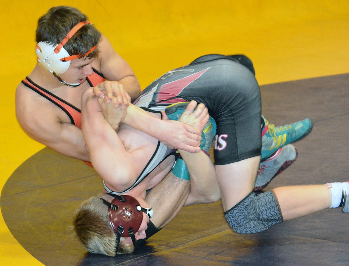 RONAN WRESTLER Hunter Peterson finished first with his victory over Eureka's Kahden Bakkila in the 126-pound weight class Saturday at the Owen Invitational at Linderman Elementary School. (Jason Blasco/Lake County Leader)