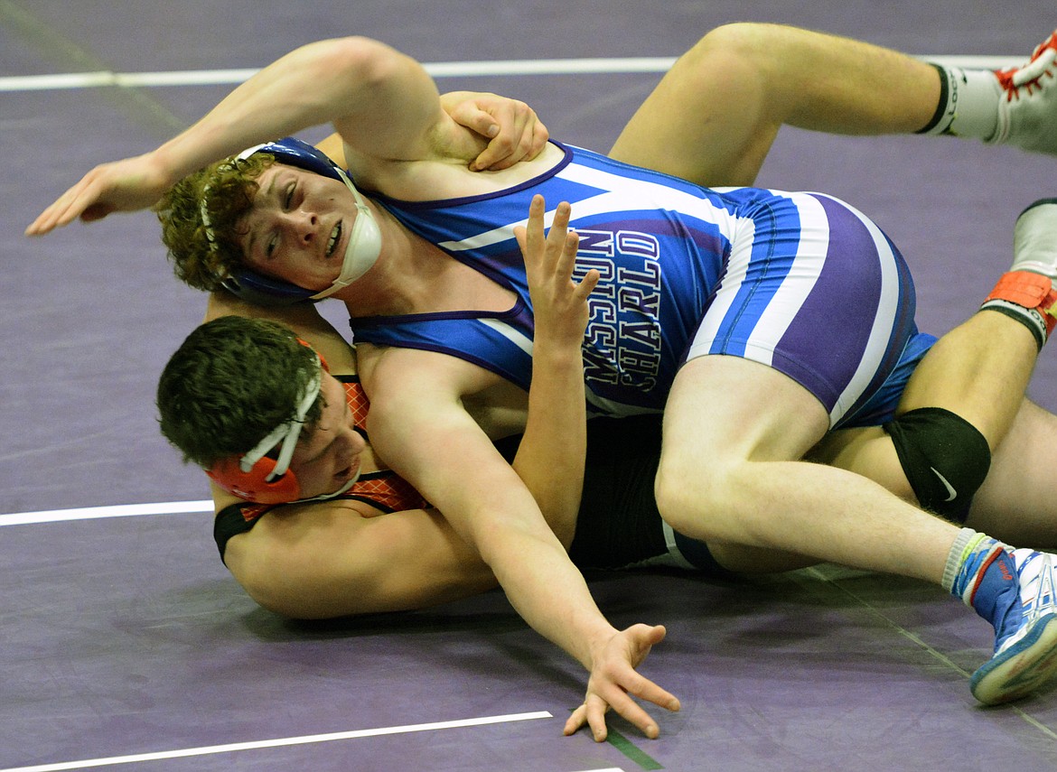 MISSION HIGH School wrestler Gus Bosley finished second to Eureka wrestler Garrett Graves in the championship of the 182-pound weight class Saturday at the Owen Invitational at Linderman Elementary School. (Jason Blasco/Lake County Leader)