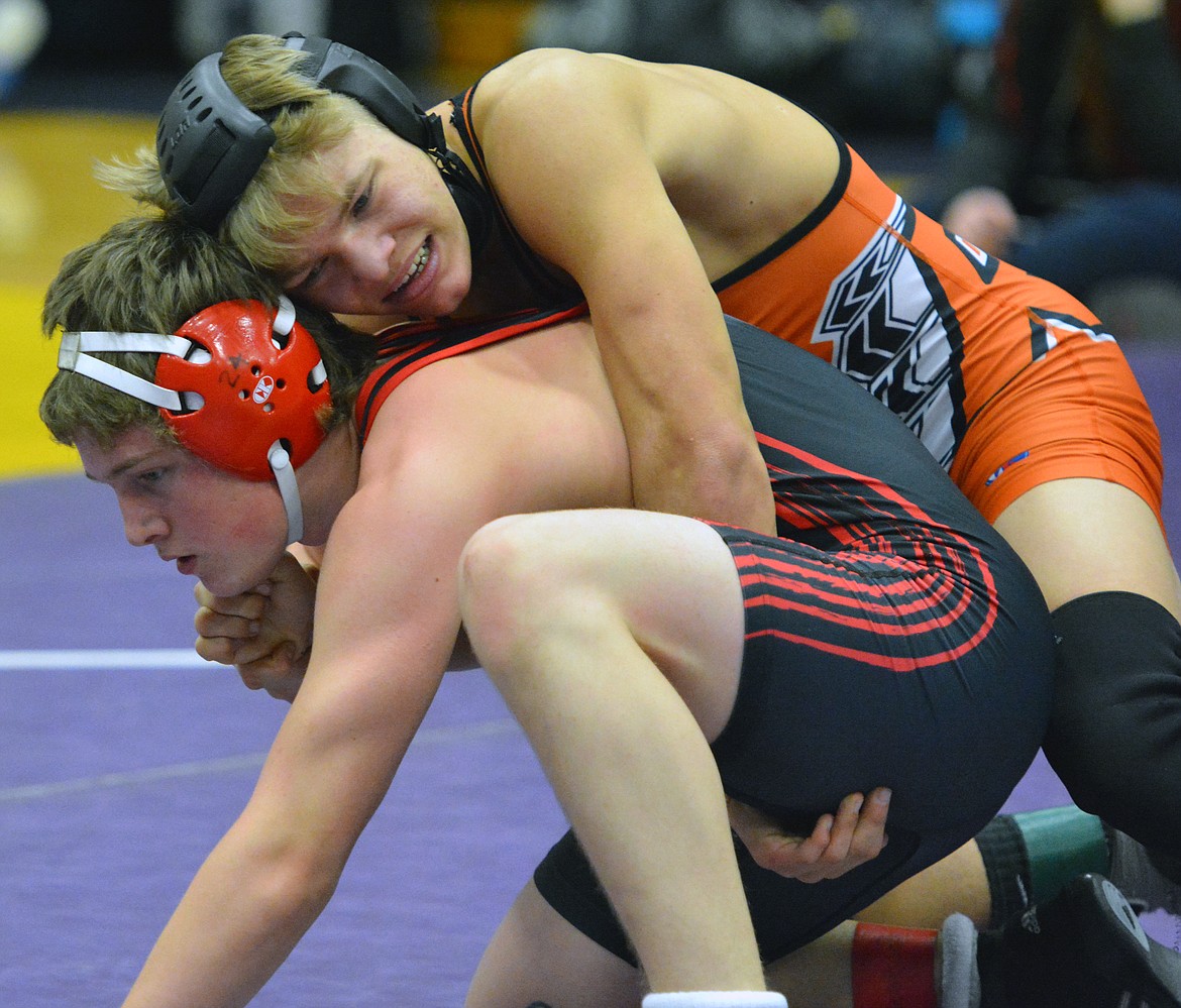 RONAN HIGH School wrestler Noah Cheff battles a wrestler at the Owen Invitational Saturday at Linderman Elementary School. (Jason Blasco/Lake County Leader)