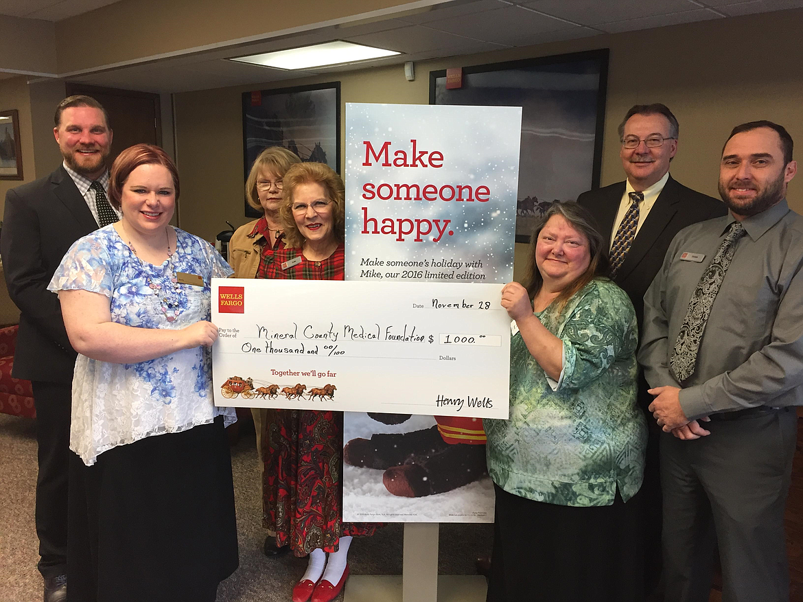 Wells Fargo Bank presented the Mineral County Medical Foundation with $1,000 to help with their county food drive on Monday, Nov. 28. (Left to right) Dan Paulsen, Wells Fargo District Manager, Shelly Larson, Superior Branch Manager, SuzAnne Galiher, Loie Turner, Casino Manager Lucky Lil&#146;s, Bonnie Fuller, MCH CEO Ron Gleason, Nolan Webber. (Photo courtesy Monte Turner)