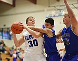 Cats edge Corvallis in home opener