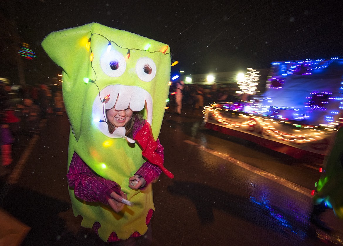 A young tooth hands out Chapstick as part of the Dr. Evon Heaser float.