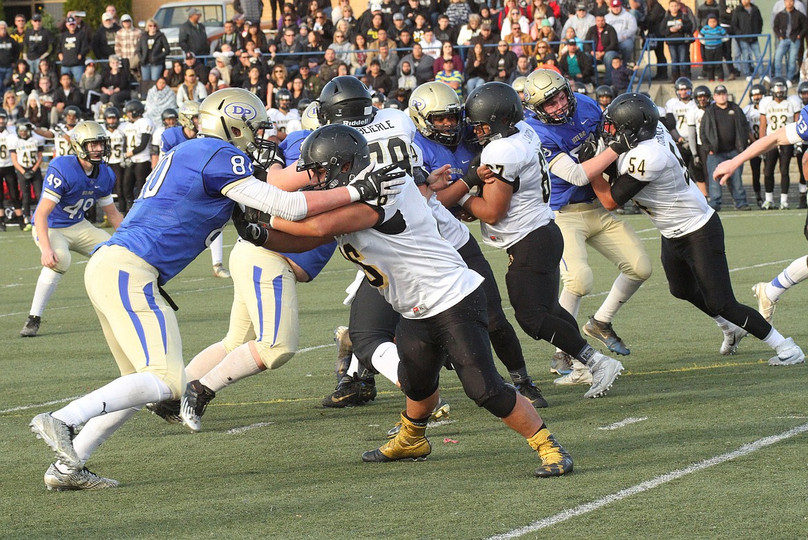 Pete Christensen Photo - Royal&#146;s offensive line of Juan Hernandez, Raynor Beierle, Tyler Dorsing, Juan Garcia and Ramses Gonzalez form a perfect passing pocket.