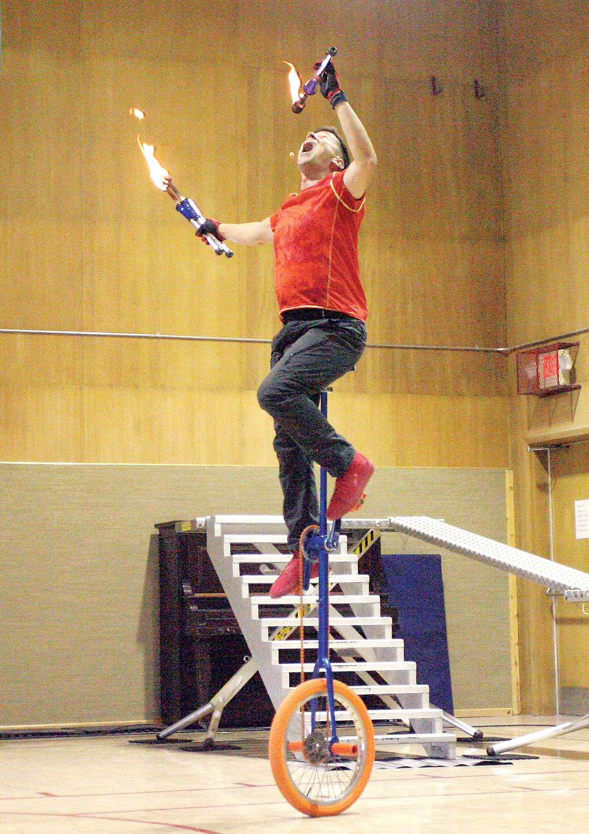 World champion unicyclist Dustin Kelm Tuesday afternoon at Kootenai Valley Christian School. (Paul Sievers/TWN)