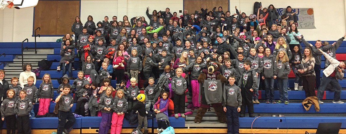 ABOVE: Montana Rail Link personnel, along with UM’s Monte, visited Superior schools last week for a presentation about railway safety and presented all the students with sweatshirts with the school’s logo. (Photo courtesy of Logan Labbe)