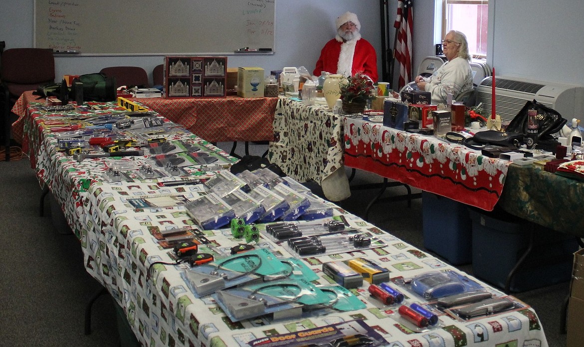 The Women in Timber held their annual Parent&#146;s Gift Table at the Superior fire house, but had a low turnout for the day. Santa was available for the children to tell him what they wanted for Christmas, but his lap remained empty most of the day. (Photo by Kathleen Woodford/Mineral Independent).