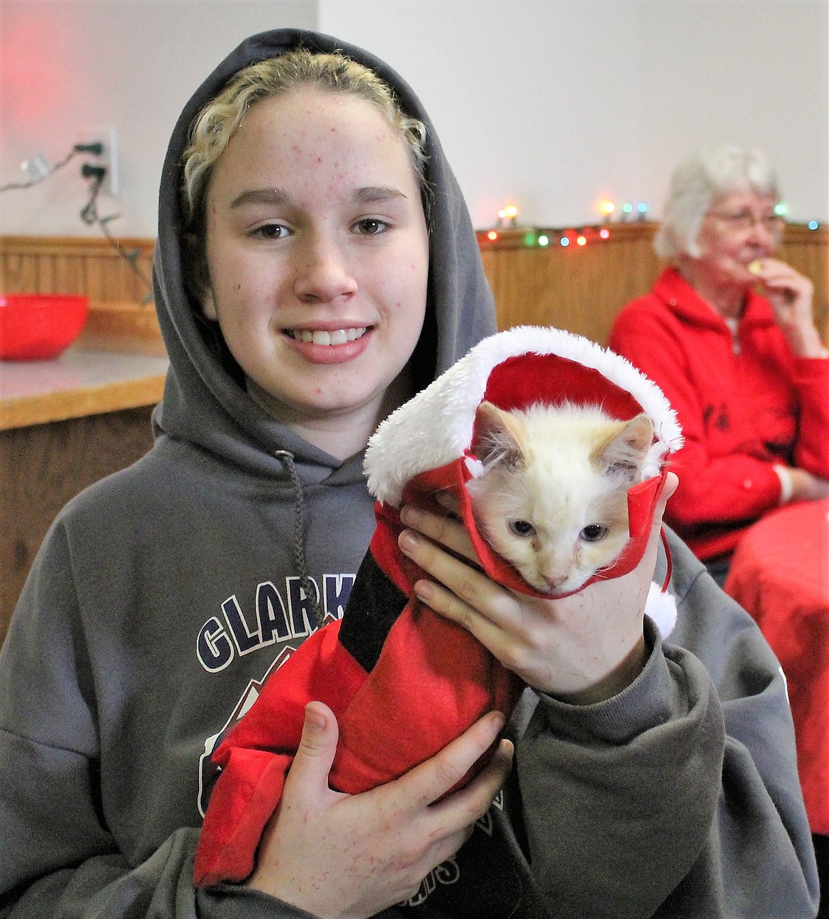 A kitten named Arlo, snuggles in a Santa stocking during a bazaar in St. Regis. Arlo belongs to 4-H member, Penny Foley.