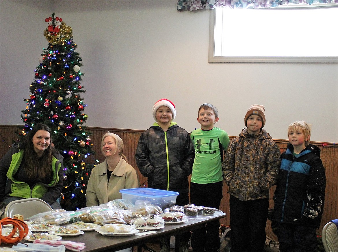 St. Regis 4-H members had a table of goodies at the Christmas bazaar at the Community Center in St. Regis on Saturday, Dec. 10.