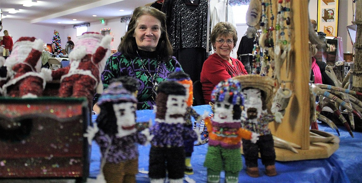 Jill Pestana featured her beaded Santa and other dolls during the Christmas bazaar in St. Regis last weekend. She said she&#146;s beaded over a million beads over the past five years. (Kathleen Woodford/Mineral Independent)