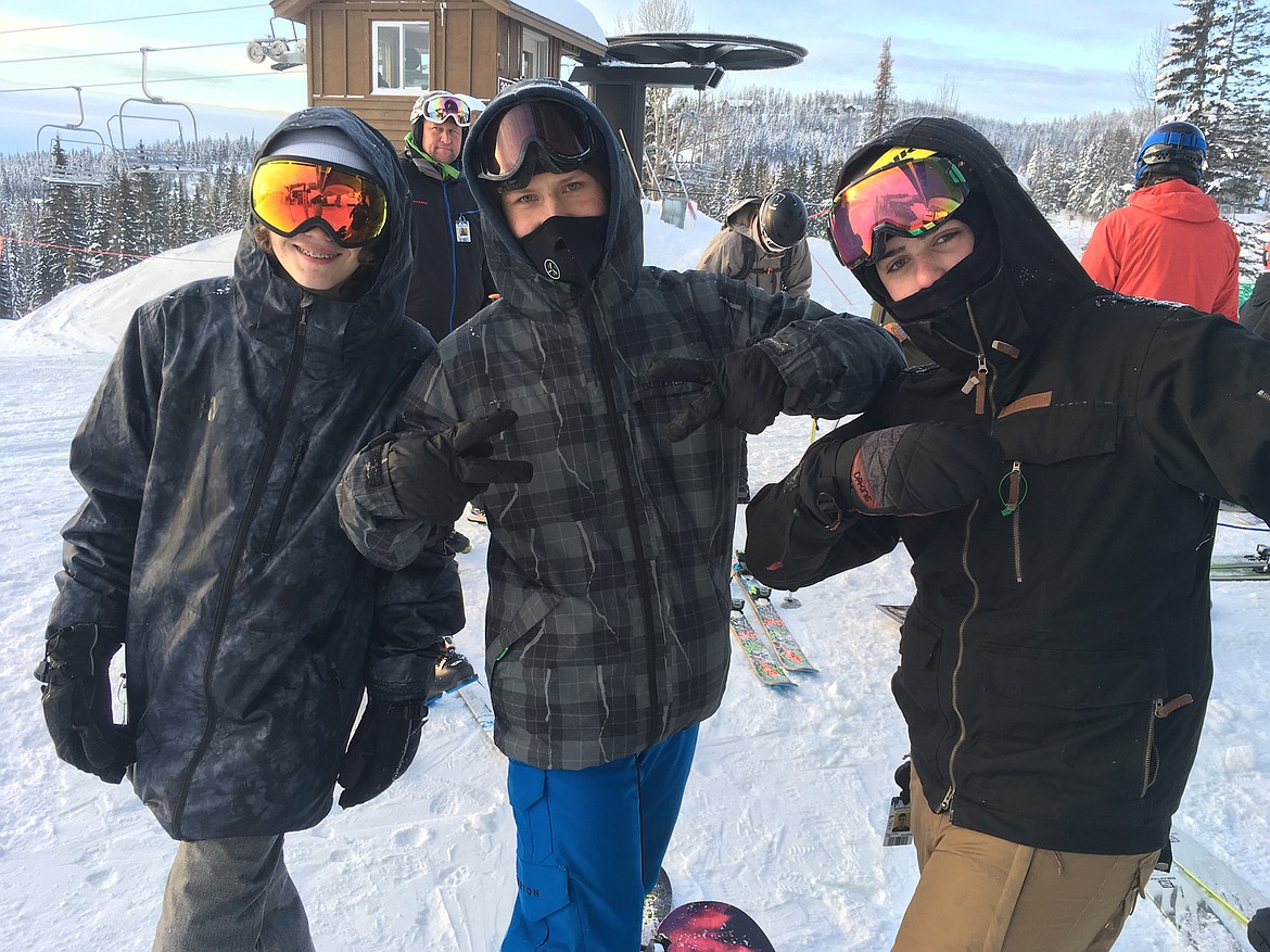 Cameron Akers, Emmenuel Khodyrev and Garrett Caffery, all of Columbia Falls, were first in line at Chair 1 on Wednesday morning for opening day at Whitefish Mountain Resort.