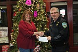 Beta Lambda donates $300 to Shop with Cop program