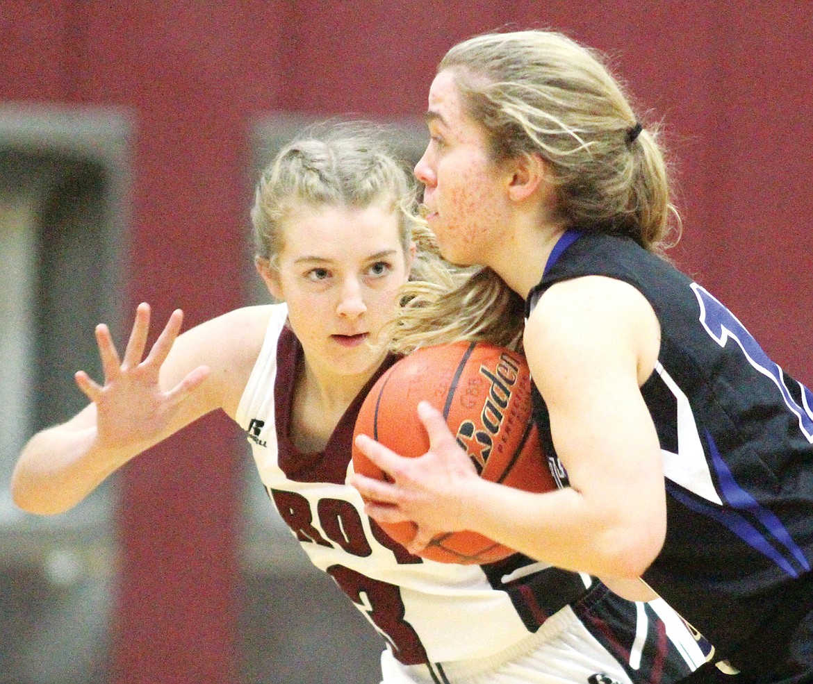 Sophomore Annie Day guarding Cora Boll in fourth quarter vs. Stillwater Christian Thursday evening. (Paul Sievers/TWN)