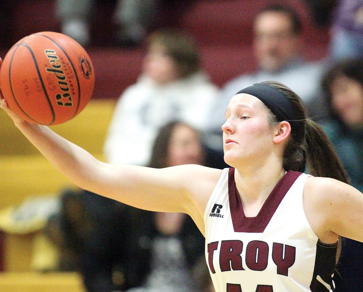 Junior guard Allie Coldwell takes control on a pass from Allie Brown in second quarter vs. Stillwater Christian Thursday evening. Lady Trojans over Stillwater 58-33. (Paul Sievers/TWN)