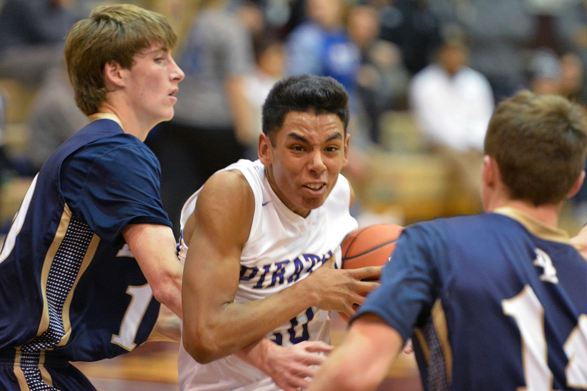 POLSON HIGH School basketball player Jaydon Bautista drives the lane in the season-opening game against Dillon at the Missoula Tip-Off Friday at the Adam's Center. (Jason Blasco/Lake County Leader)