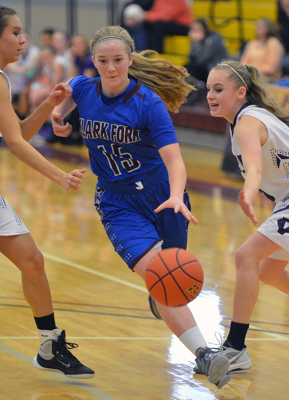 A CLARK FORK dribbler splits the defense.