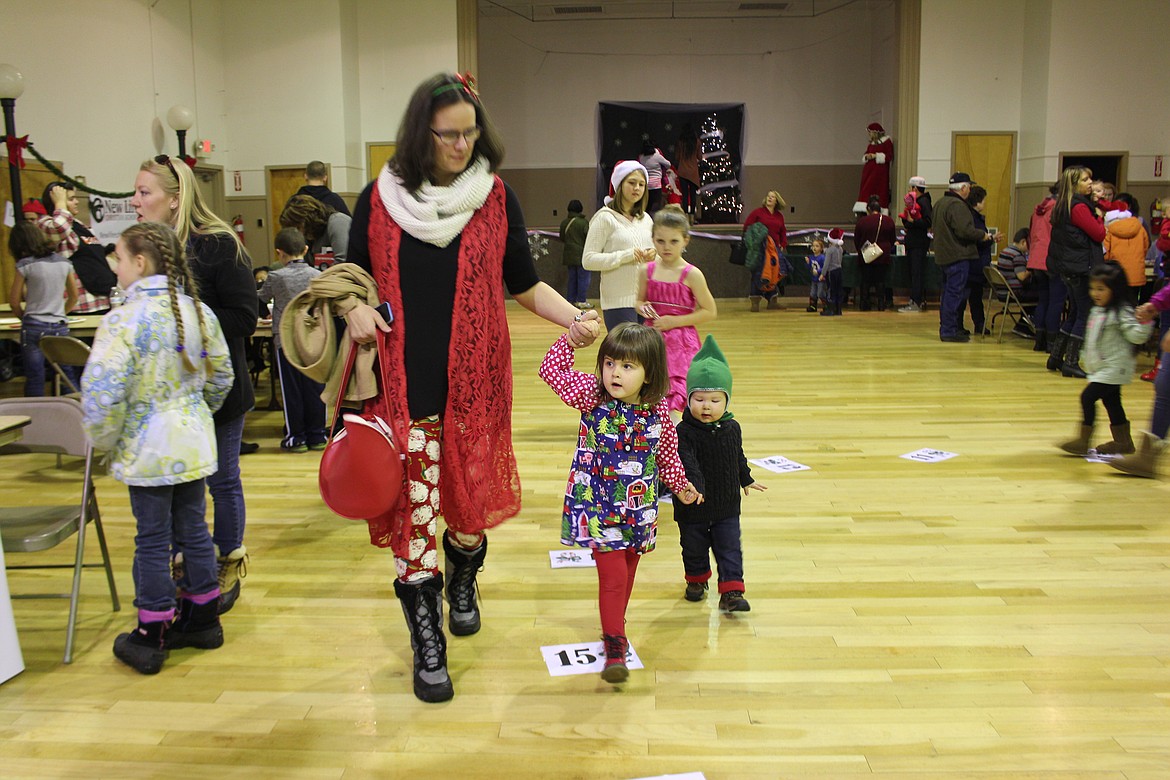 Cheryl Schweizer/Columbia Basin Herald
The candy cane walk was a popular attraction at the &#145;Miracle on Main Street&#146; town holiday celebration in Ephrata Saturday.